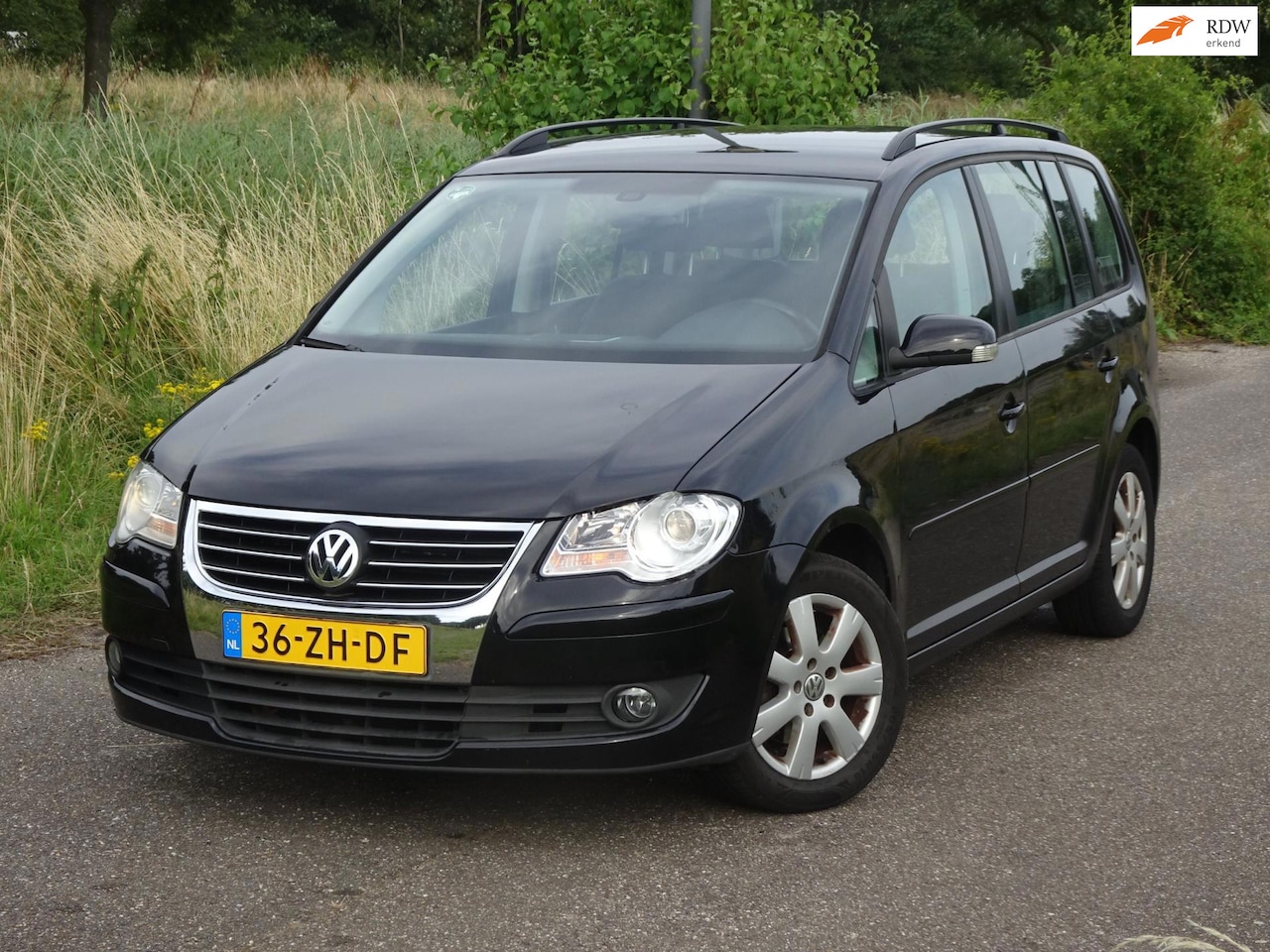 Volkswagen Touran - 1.4 TSI Comfortline 7PERSOON DSG AIRCO/APK - AutoWereld.nl