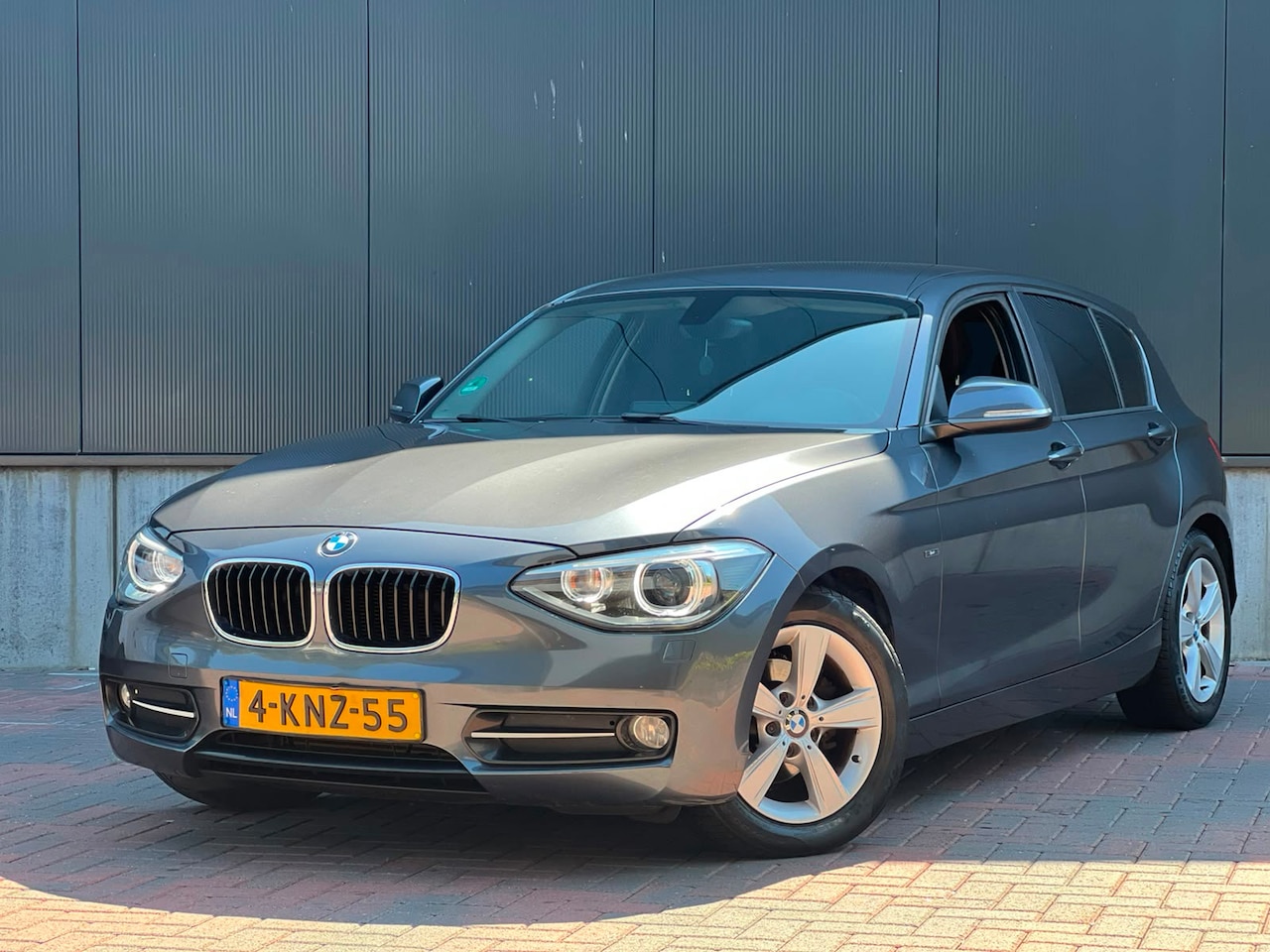BMW 1-serie - 116i EDE Executive Sport * Cruise * Navi * Led * Climate * Goed Onderhouden * - AutoWereld.nl