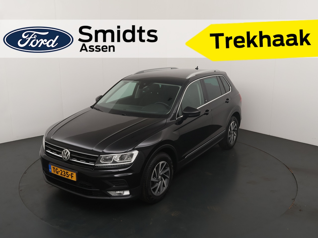 Volkswagen Tiguan - 1.4 TSI ACT Sound 150PK | Adap. cruise | Trekhaak | Stoel Verw. | All season | PDC | Clima - AutoWereld.nl