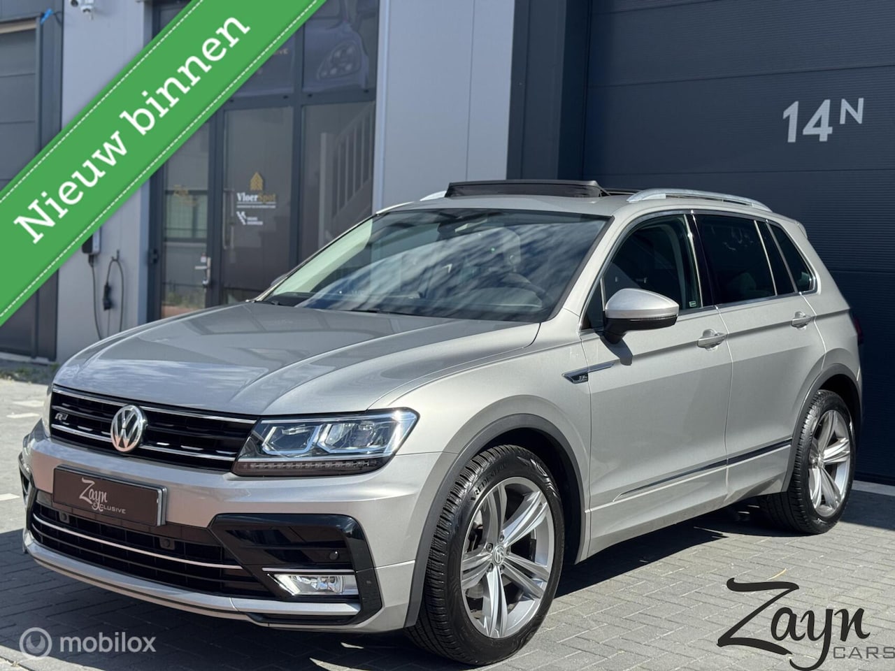 Volkswagen Tiguan - 1.4 TSI ACT R-Line | Pano | Xenon | ERGO | - AutoWereld.nl