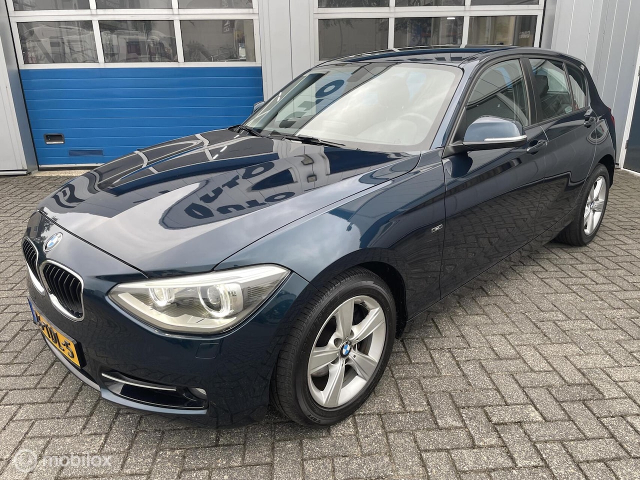 BMW 1-serie - 118i 170Pk Automaat Sport Line Trekhaak-Cruise - AutoWereld.nl