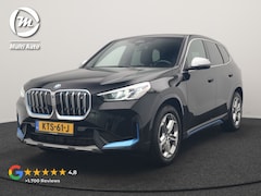 BMW iX1 - xDrive30 X Line 67 kWh 313pk Dealer O.H. | Trekhaak Af Fabriek | Adaptive Cruise | Lederen
