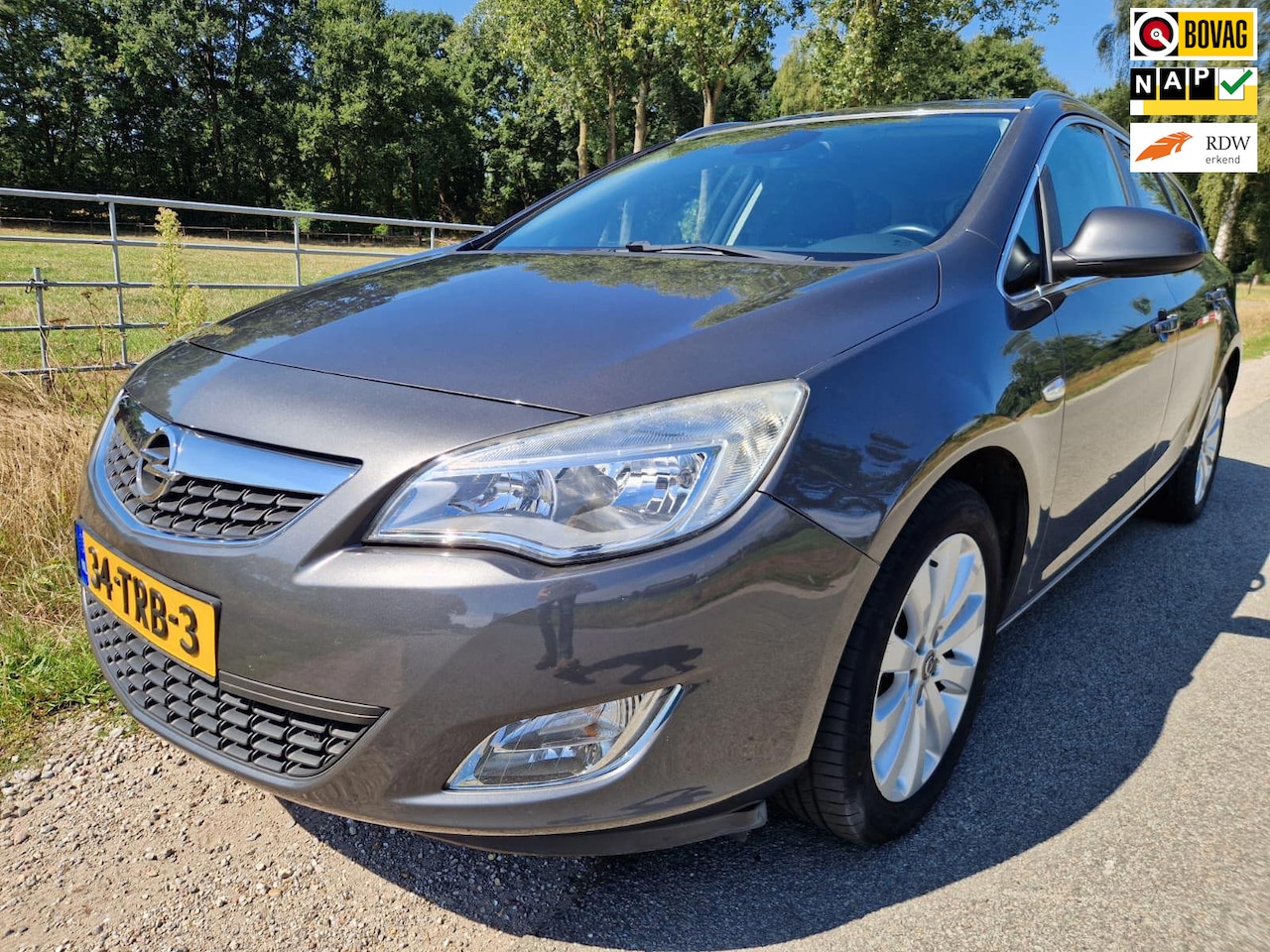 Opel Astra Sports Tourer - 1.4 Turbo Cosmo pas 76.400km dealer ond. zeer mooi - AutoWereld.nl