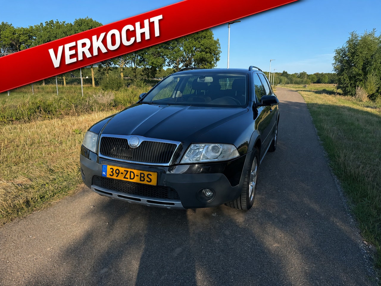 Skoda Octavia Combi - 2.0 TDI Scout 4x4 UNIEK - AutoWereld.nl