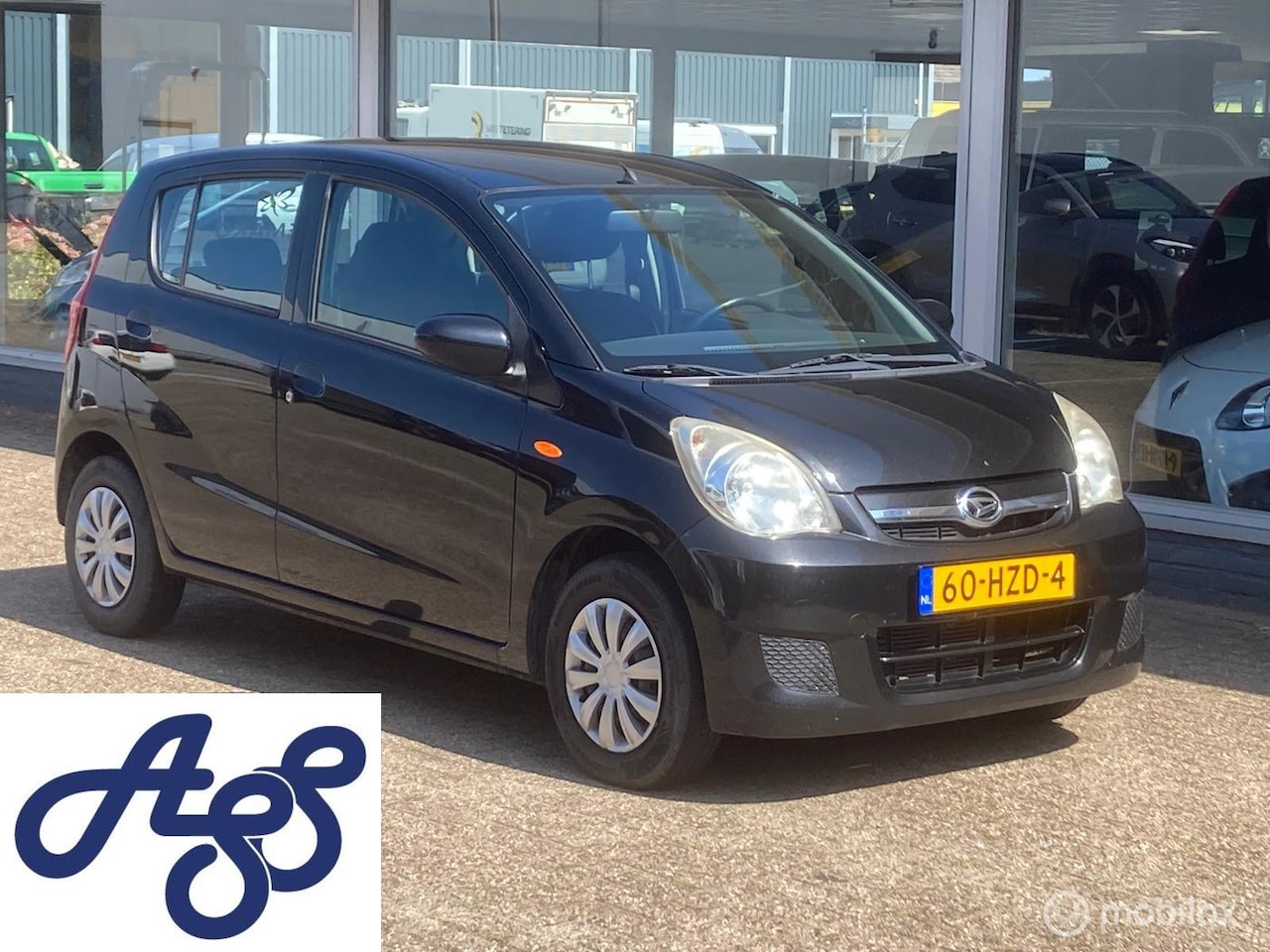 Daihatsu Cuore - 1.0 bj 3-09 209341 km NAP APK 12-6-27 - AutoWereld.nl