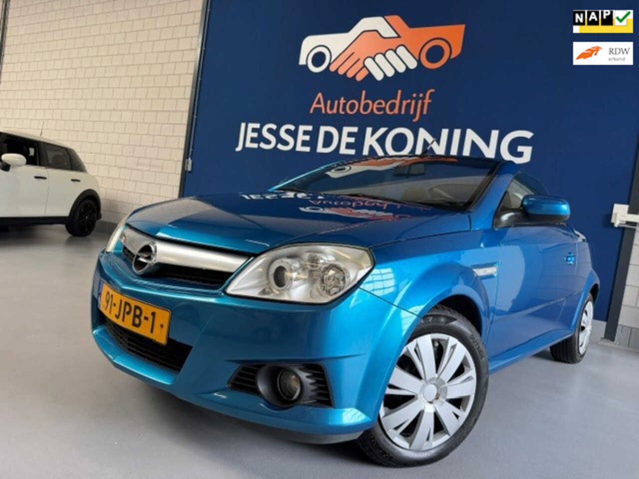 Opel Tigra TwinTop - 1.4-16V Rhythm / bj.2009 / kleur: blauw / NAP met 156174 km.en APK tot 05/2027 / Hardtop C - AutoWereld.nl