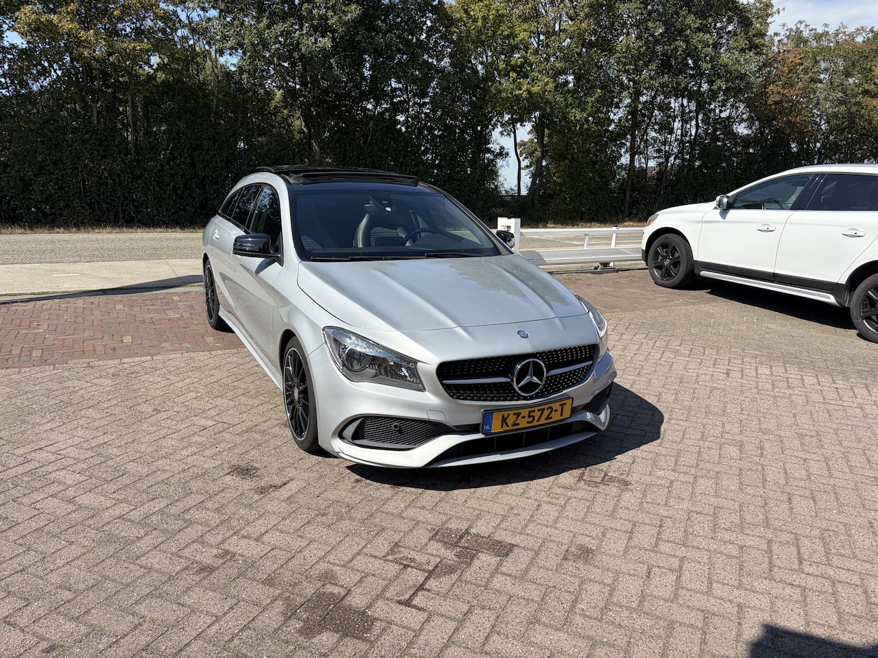 Mercedes-Benz CLA-klasse Shooting Brake - 200 AMG AUTOMAAT OPEN DAK TREKHAAK - AutoWereld.nl