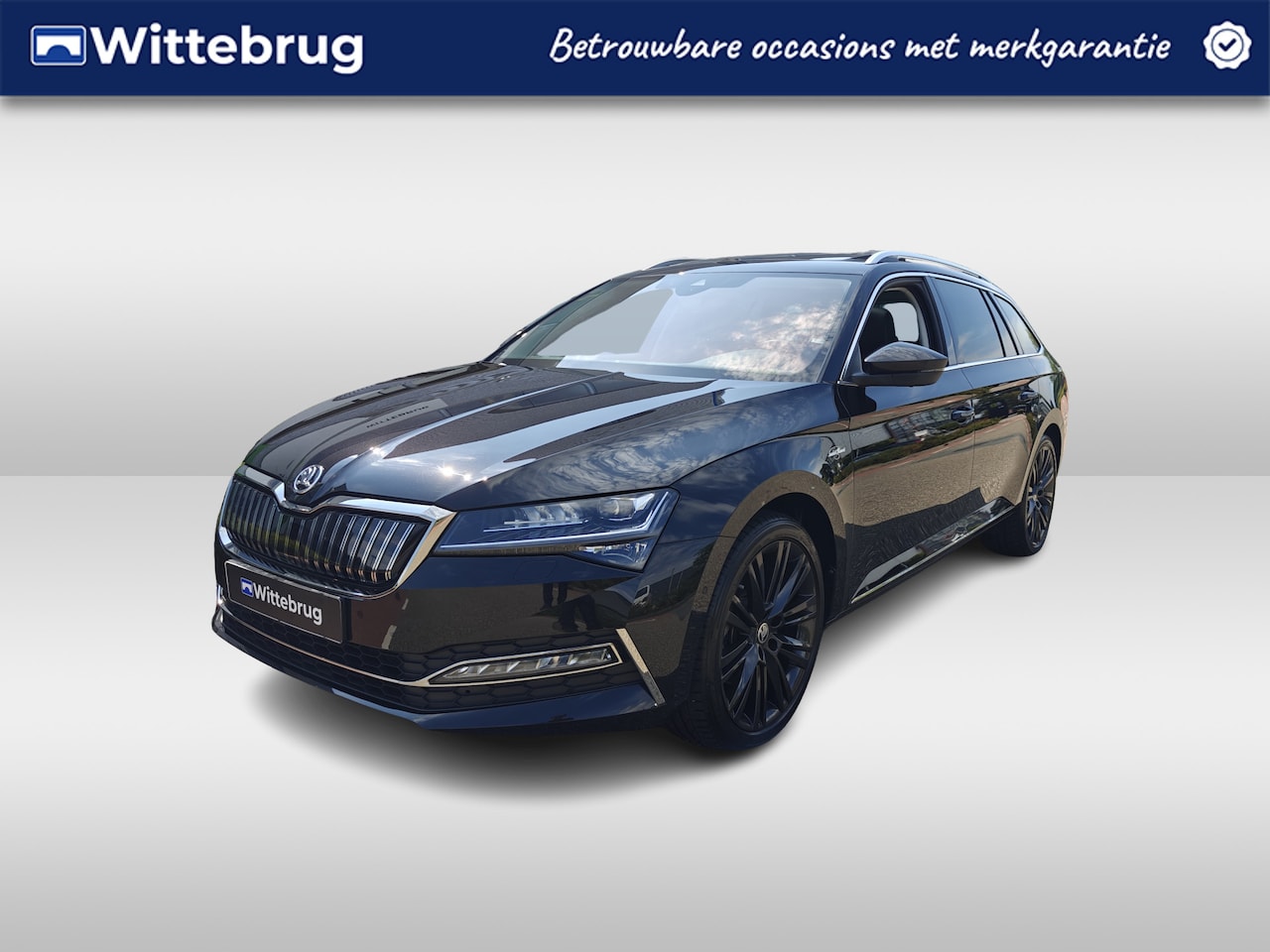 Skoda Superb Combi - 1.4 TSI 218pk iV Laurin & Klement / Panoramadak / Leer / Elec. Trekhaak / App. Connect / 1 - AutoWereld.nl