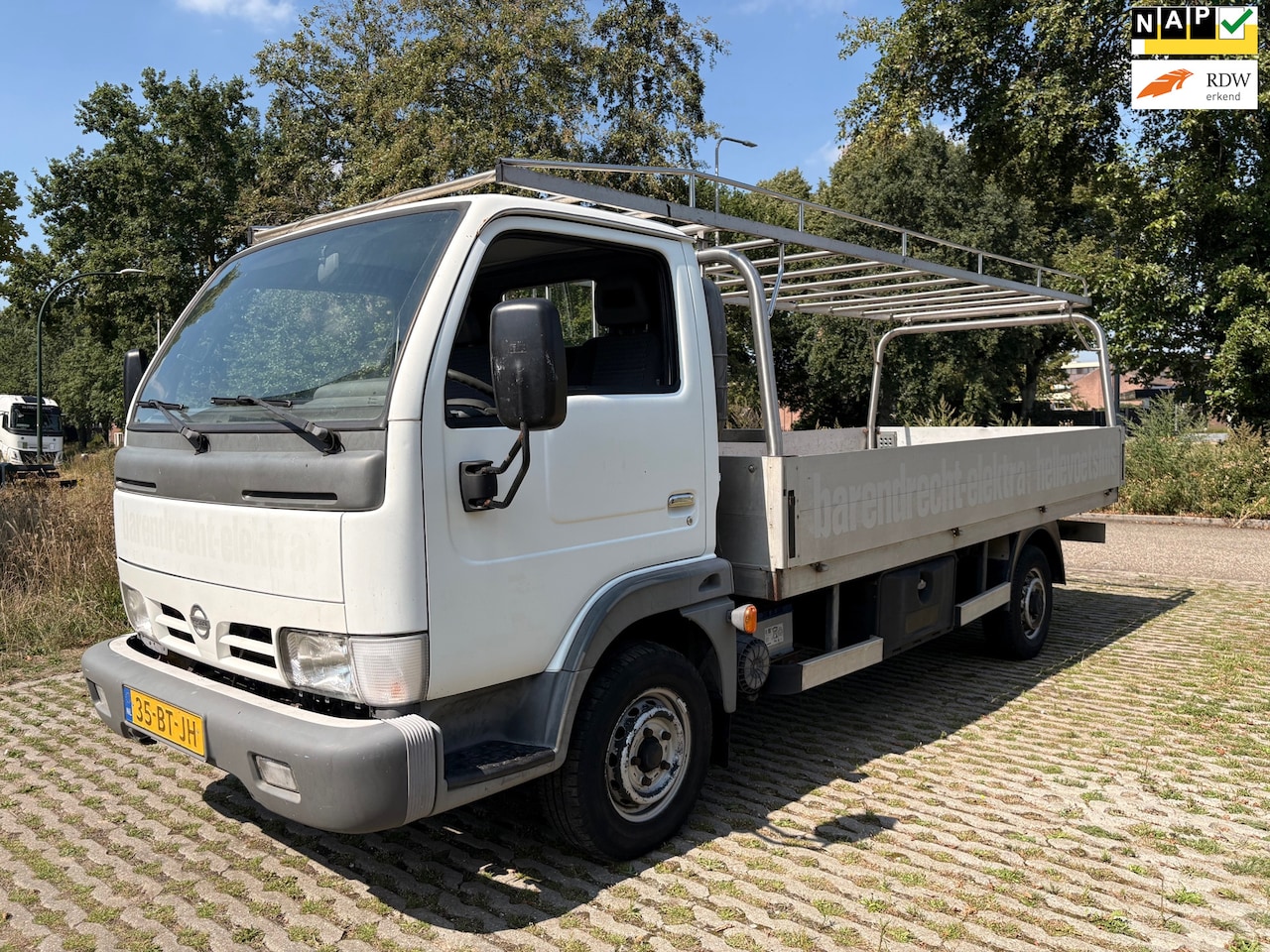 Nissan Cabstar E - 105.32-340 3.0TD - openlaadbak - nieuwe apk tot 08-2027 - AutoWereld.nl