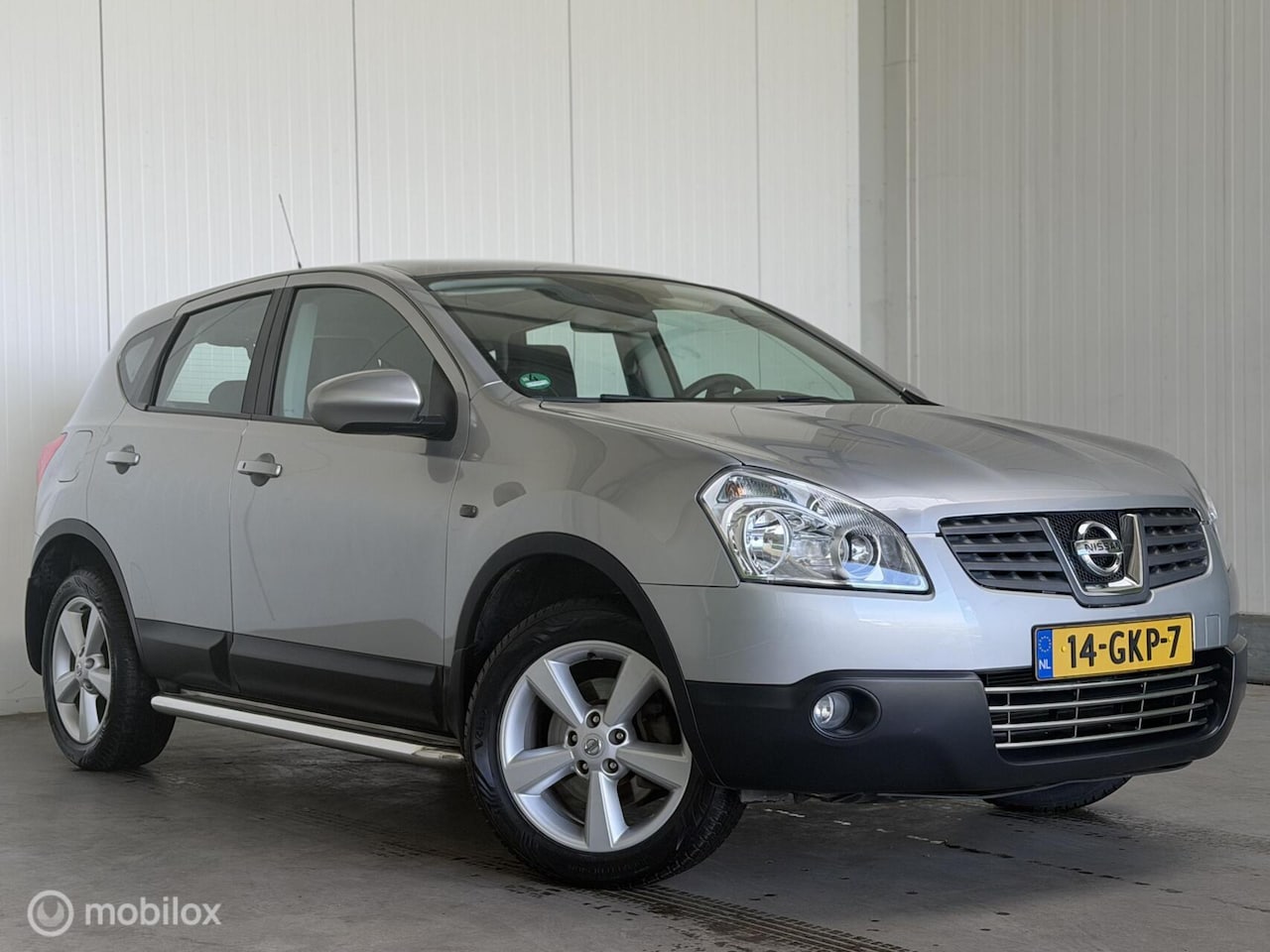 Nissan Qashqai - 2.0 Tekna Pack Pano|Trekhaak|PDC - AutoWereld.nl