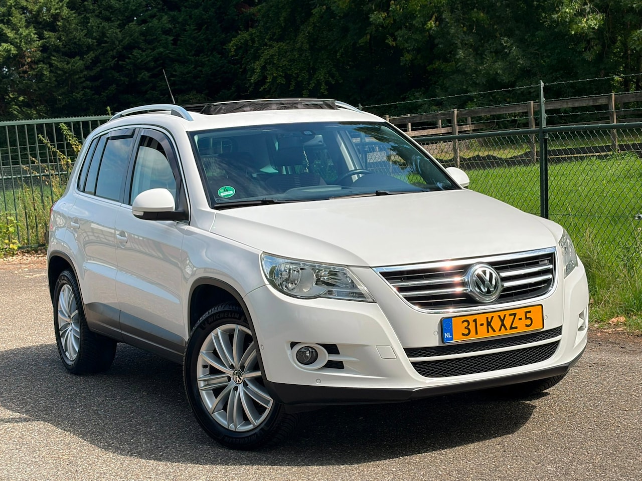 Volkswagen Tiguan - 2.0 TSI Sport&Style 4Motion /Automaat/Pano/Navi/Airco/ - AutoWereld.nl