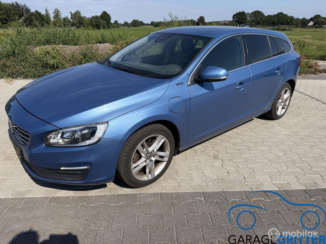 Volvo V60 - 2.4 D6 Twin Engine R-Design 2.4 D6 Twin Engine R-Design - AutoWereld.nl