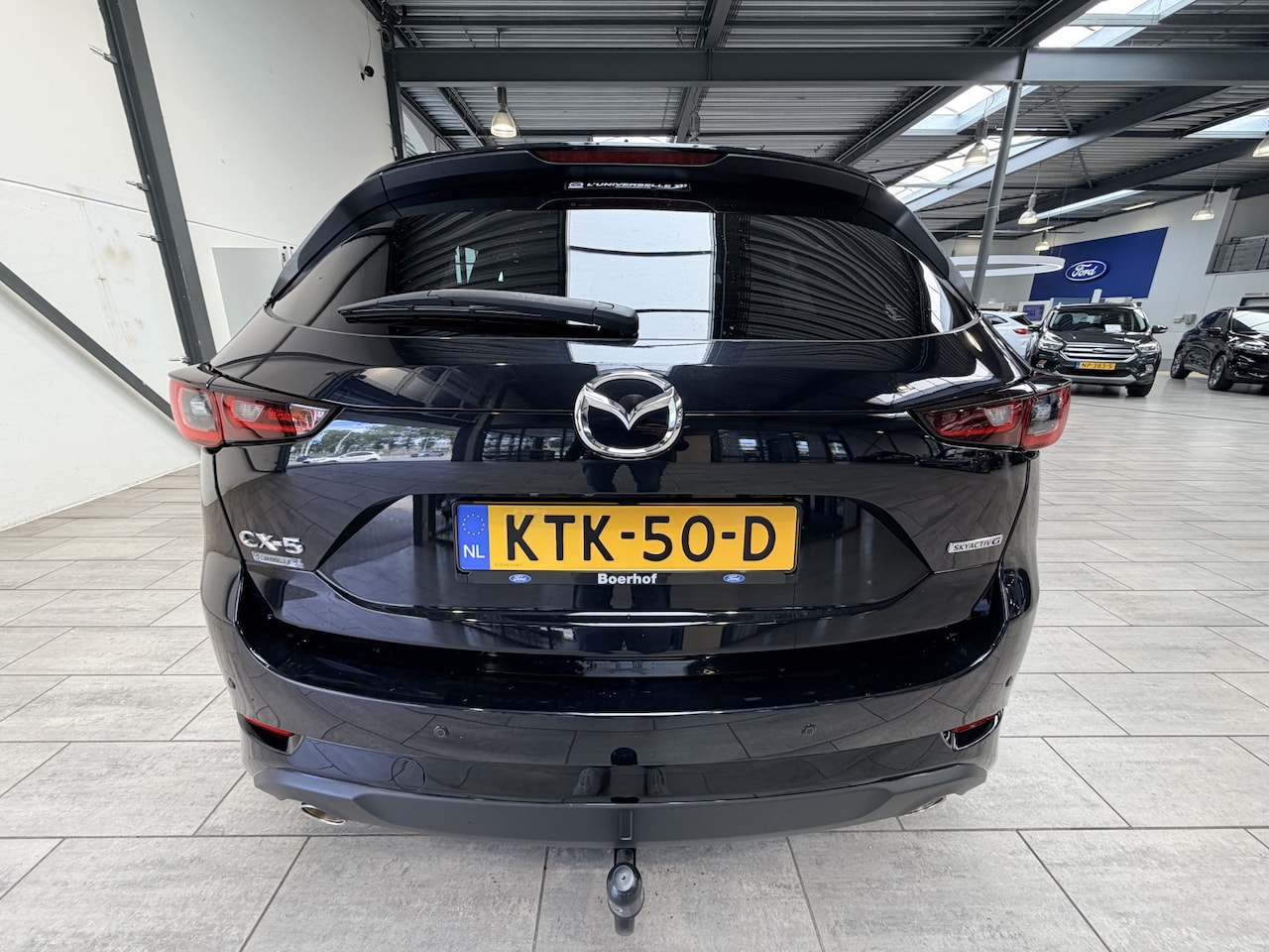 Mazda CX-5 - 2.0 SkyActiv-G 165pk Homura | Trekhaak | 19" | 360° camera | Bose | LED | Half leer | El. - AutoWereld.nl