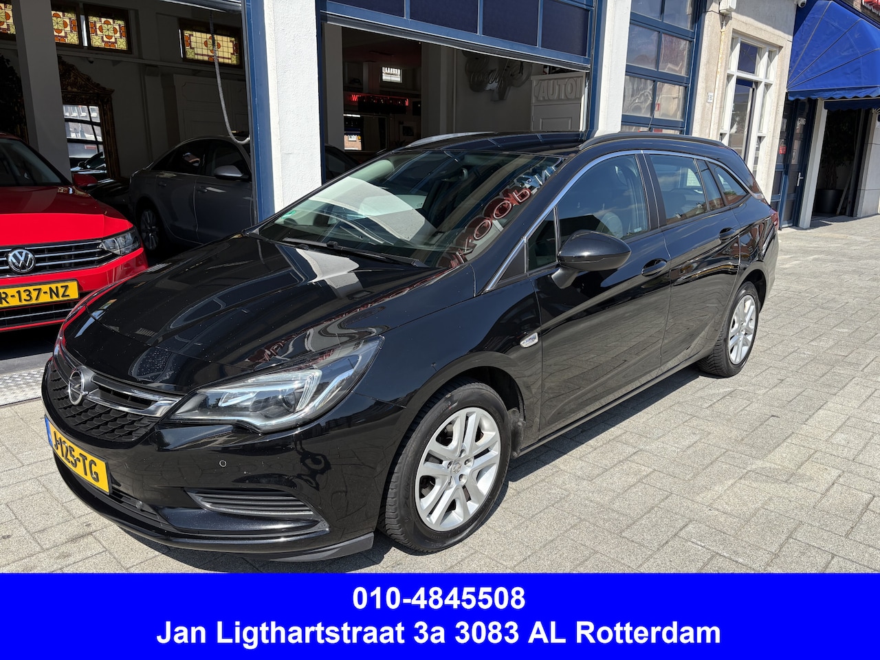 Opel Astra Sports Tourer - 1.4 Business Executive AUTOMAAT/AIRCO/CARPLAY/STUUR/STOEL VERW. - AutoWereld.nl