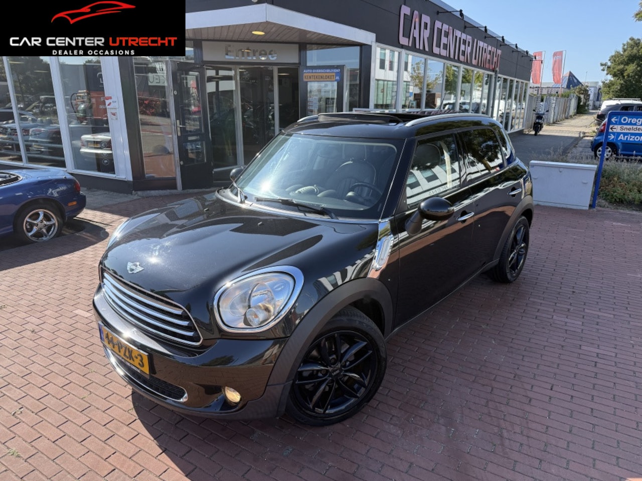 MINI Countryman - Mini 1.6 Cooper Chili leder 6vers airco pano - AutoWereld.nl