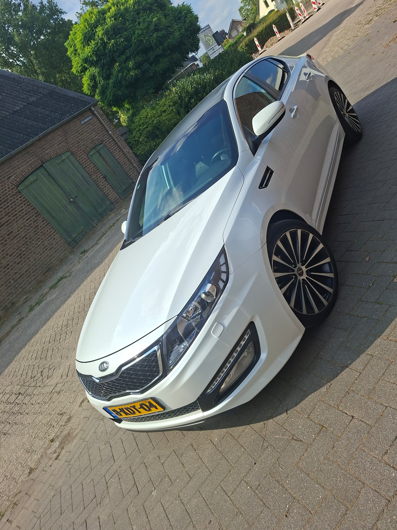 Kia Optima - 2.0 CVVT Hybrid Super Pack - AutoWereld.nl