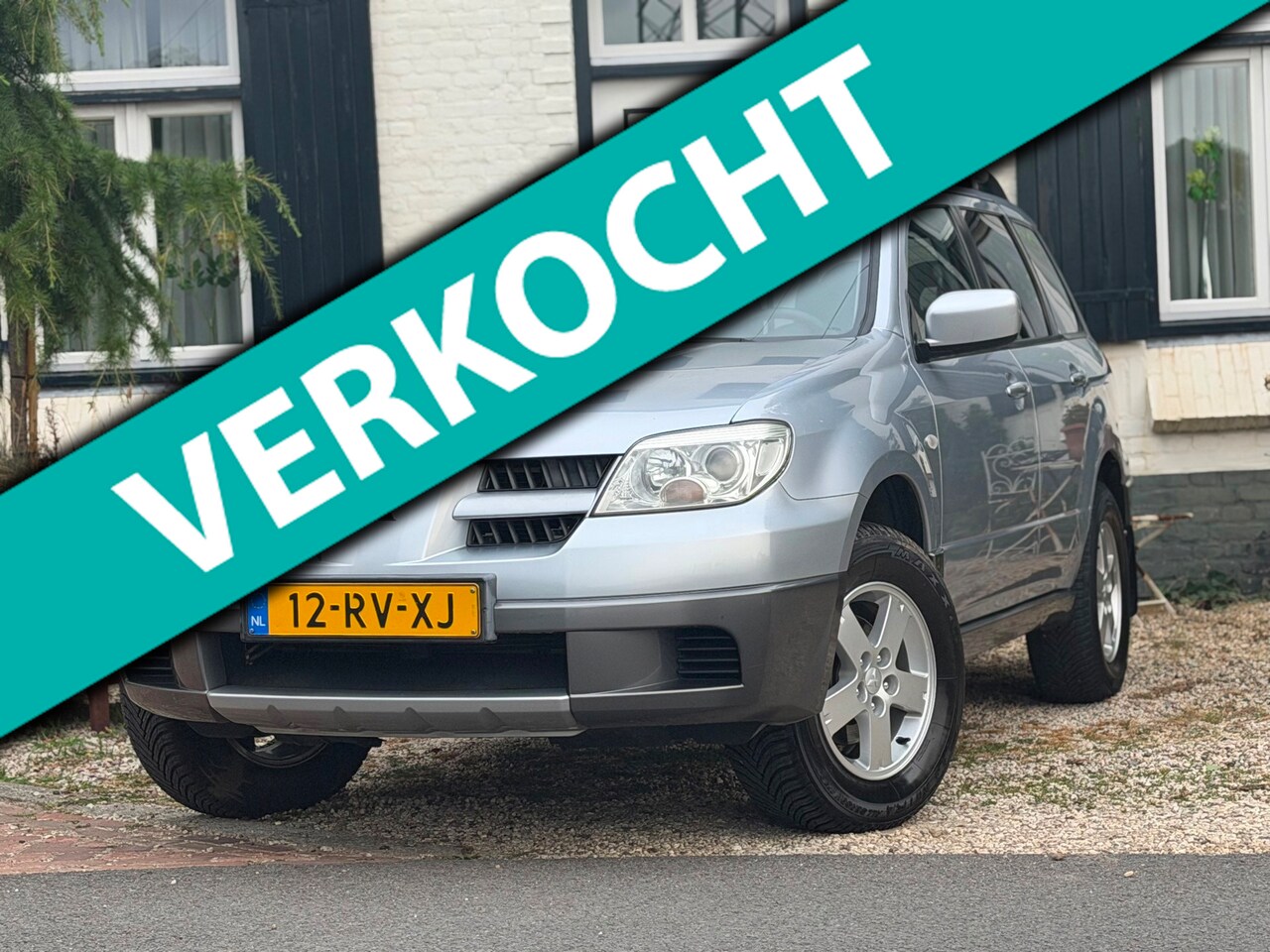 Mitsubishi Outlander - 2.0 Invite plus|Airco|Trekhaak|Goed onderhouden| - AutoWereld.nl