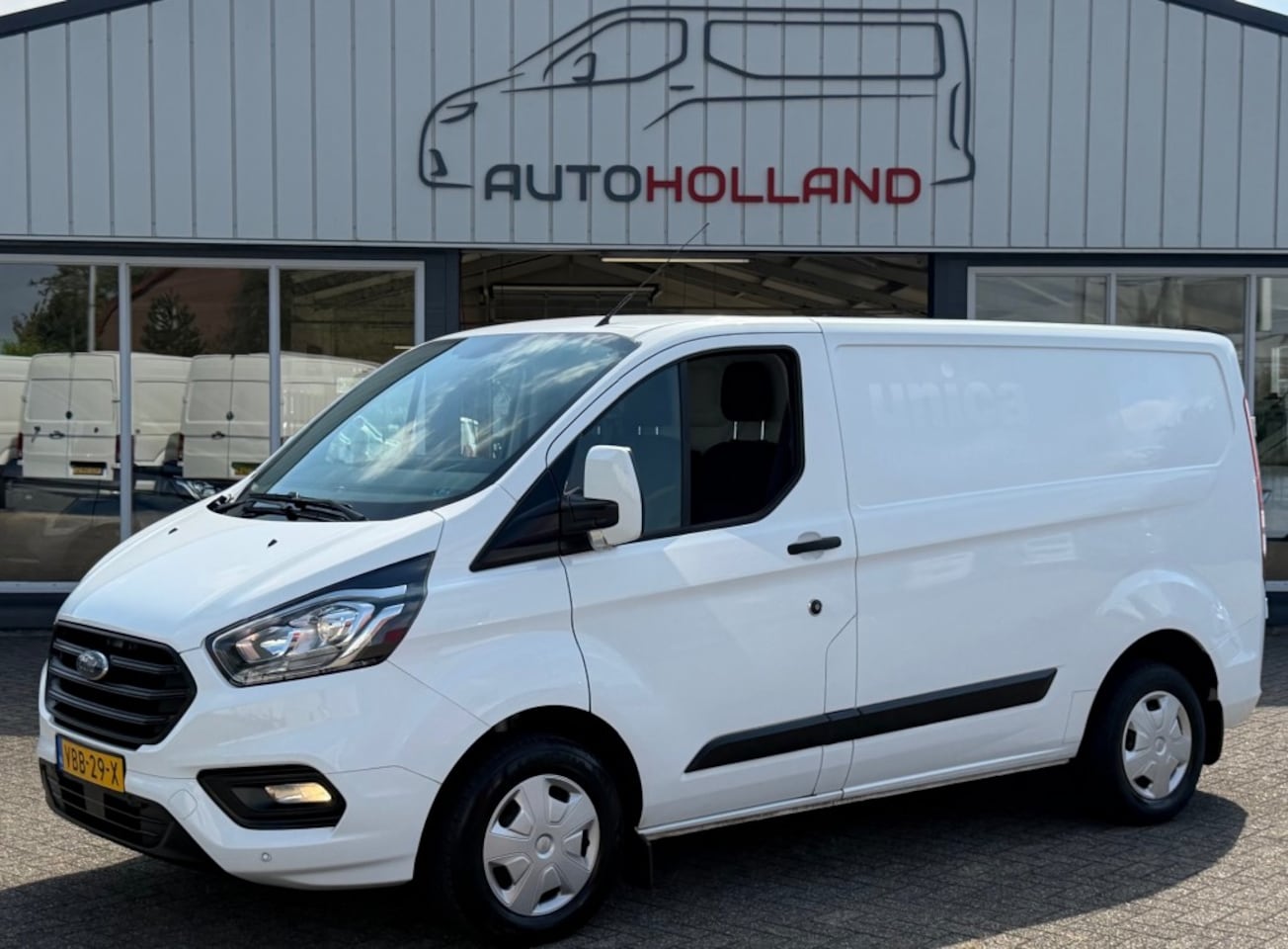 Ford Transit Custom - 2.0 TDCI 77KW 105PK EURO 6 AIRCO/ TREKHAAK/ BIJRIJDERSBANK/ CRUISE CONTROL/ 100% DEALEROND - AutoWereld.nl