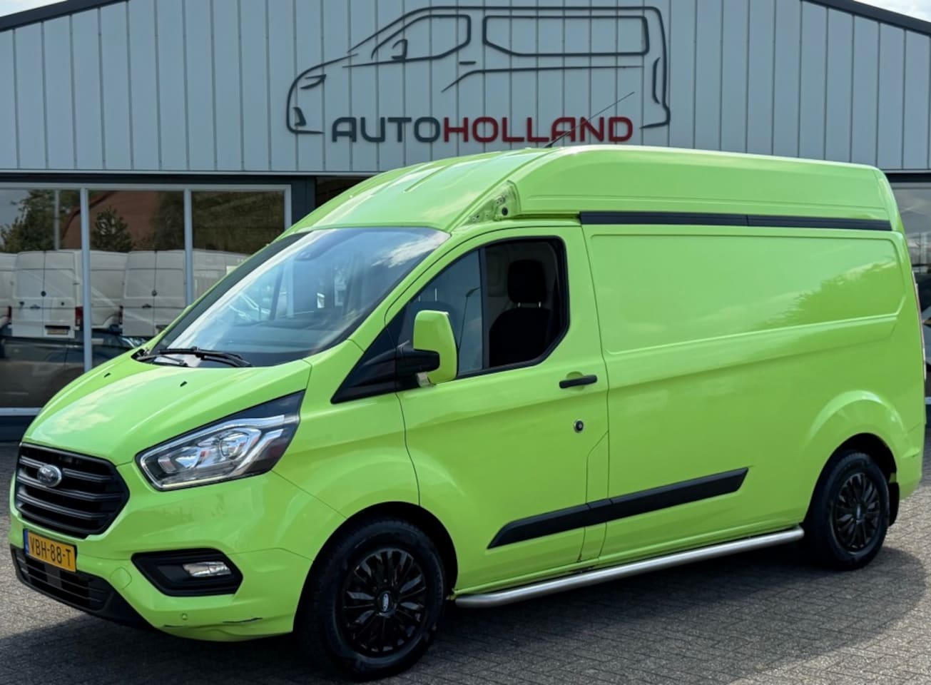 Ford Transit Custom - 2.0 TDCI 96KW 131PK L2H2 AUTOMAAT EURO 6 AIRCO/ CAMERA/ TREKHAAK/ 100% DEALERONDERHOUDEN - AutoWereld.nl