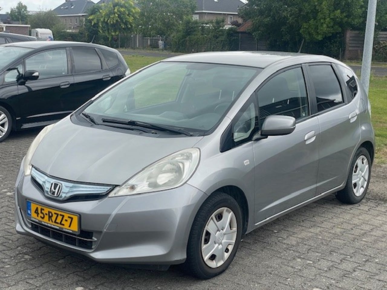 Honda Jazz - Hybrid Automaat/ ECC/ Weinig km's/ Zuinig - AutoWereld.nl