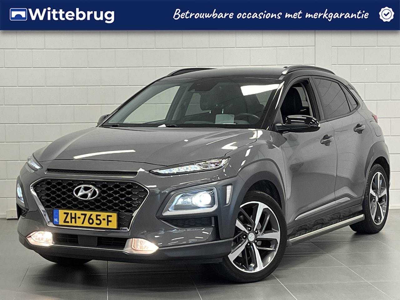 Hyundai Kona - 1.0 T-GDI Premium LEDER | SIDEBARS | LED VERLICHTING | ZEER COMPLEET UITGERUST! - AutoWereld.nl