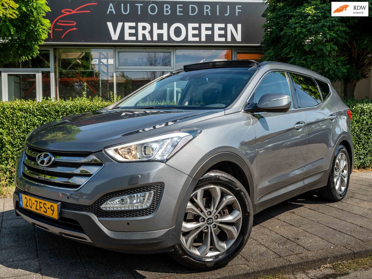 Hyundai Santa Fe - 2.4i GDI 4WD i-Catcher 7p. - AUTOMAAT - PANORAMADAK - PARK CAMERA - STOEL VERW - LEDER ZWA - AutoWereld.nl
