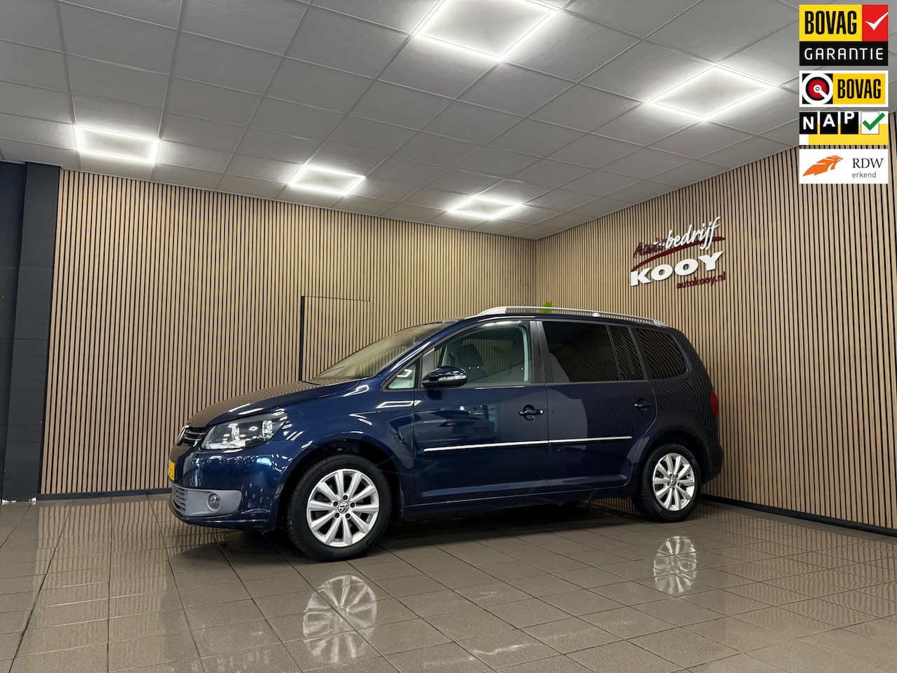 Volkswagen Touran - 1.2 TSI Highline BlueMotion * Trekhaak / Navigatie / LM Velgen / NL Auto * - AutoWereld.nl