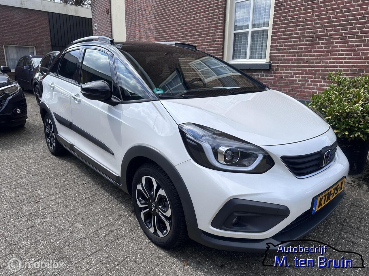 Honda Jazz - 1.5 e:HEV Crosstar Two-tone (zwart dak) - AutoWereld.nl