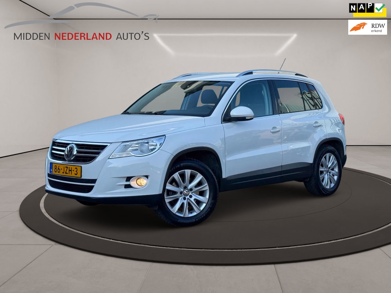 Volkswagen Tiguan - 1.4 TSI Sport&Style * PDC * NETTE STAAT * NAP PAS * APK 2027 * - AutoWereld.nl