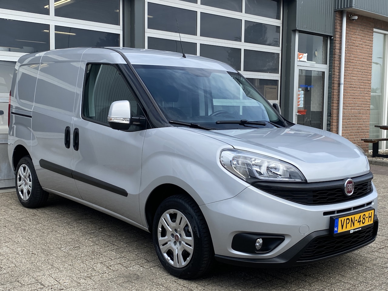 Fiat Doblò Cargo - 1.3 MJ L1H1 SX Btw en Bpm vrij Airco Cruise controle Navigatie Tussenschot Parkeerhulp ach - AutoWereld.nl