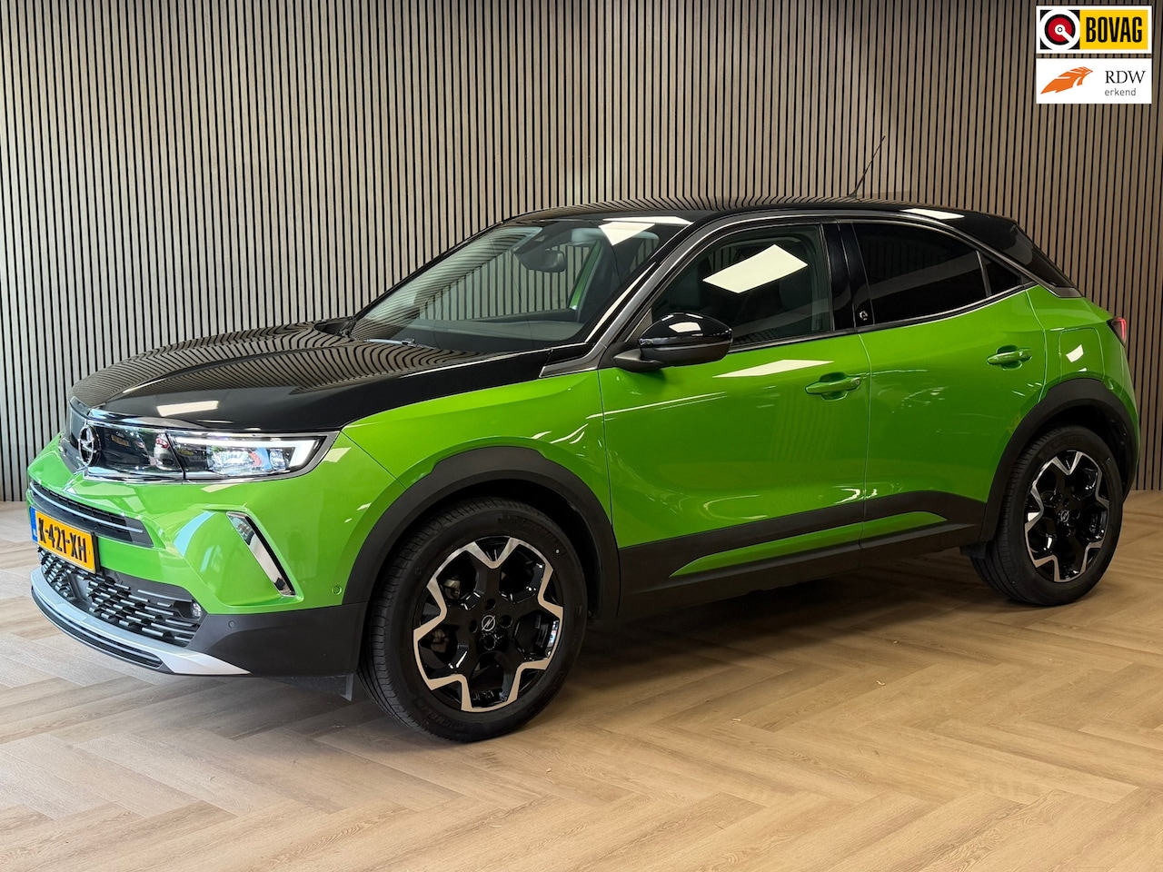Opel Mokka-e - Ultimate 50-kWh 11kw bl SOH 90.5% CAMERA CRUISE APPLE CARPLAY PDC STOEL & STUURVERWARMING - AutoWereld.nl