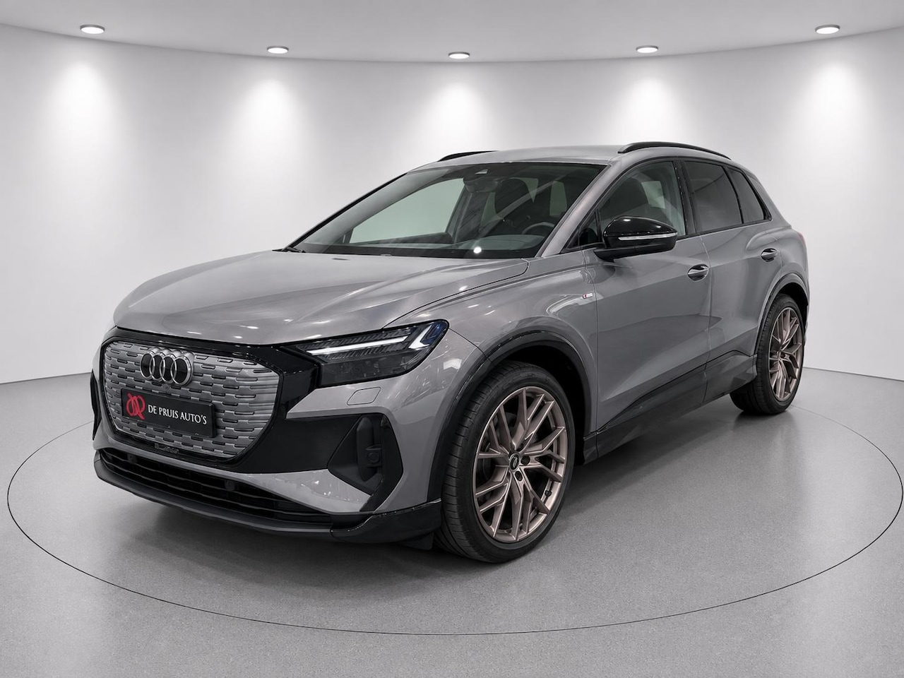 Audi Q4 e-tron - 40 S edition Brons 77 kWh Martix Panorama 21 Inch Sonos Sound Haed Up Leer - AutoWereld.nl