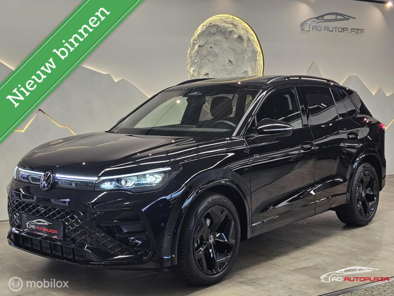 Volkswagen Tiguan - 1.5 eTSI R-Line Panorama/Leder/Black Style - AutoWereld.nl