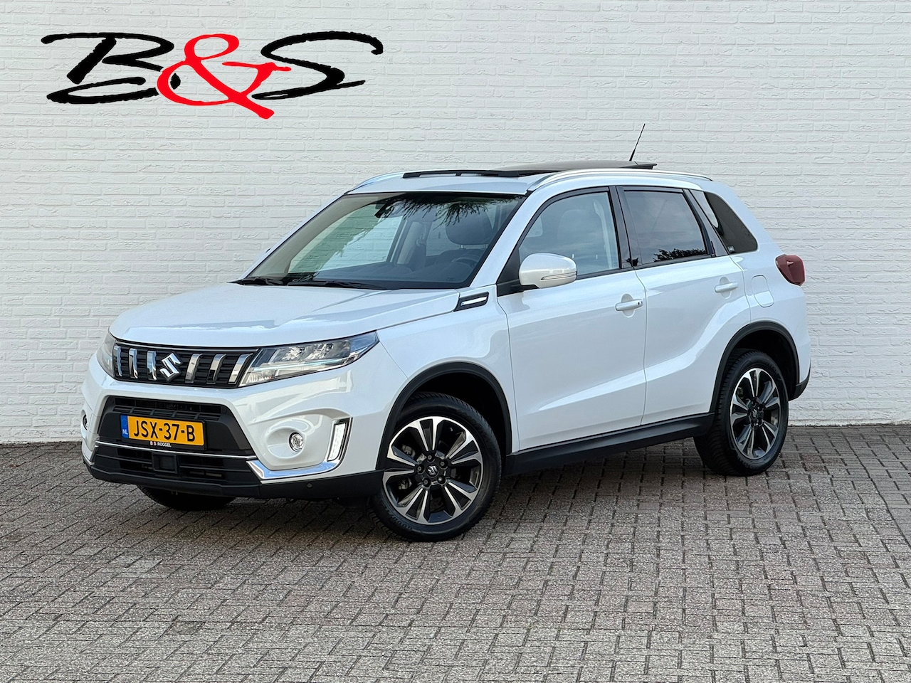 Suzuki Vitara - 1.5 Hybrid Panorama Full led Automaat Camera+Pdc Stoelverwarming Adapt. Cruise Navi - AutoWereld.nl