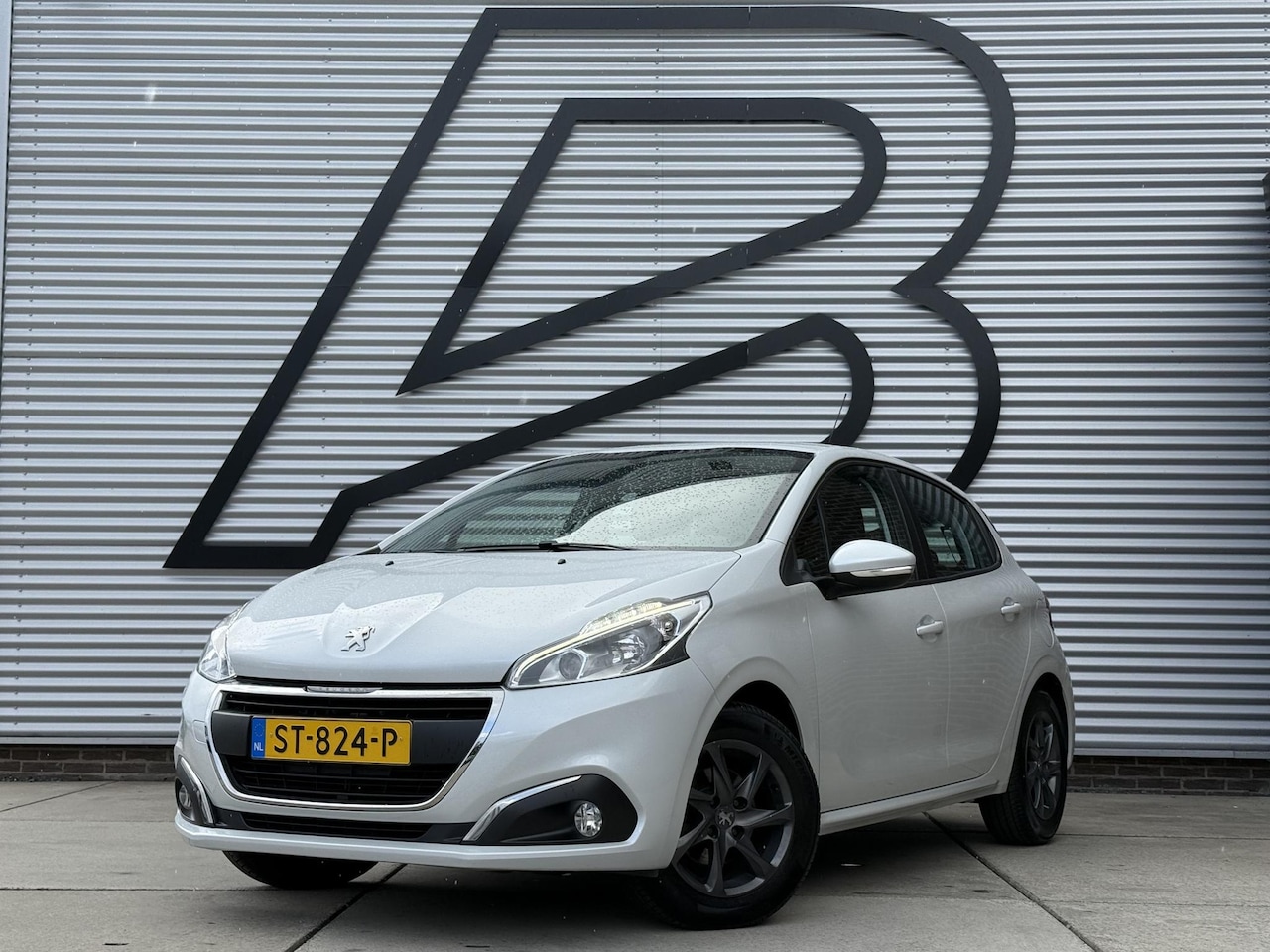 Peugeot 208 - 1.2 PureTech Blue Lion 2e Eigenaar|Navi|Carplay|Airco|Cruise|PDC|N.A.P|APK tot 05-2027 - AutoWereld.nl