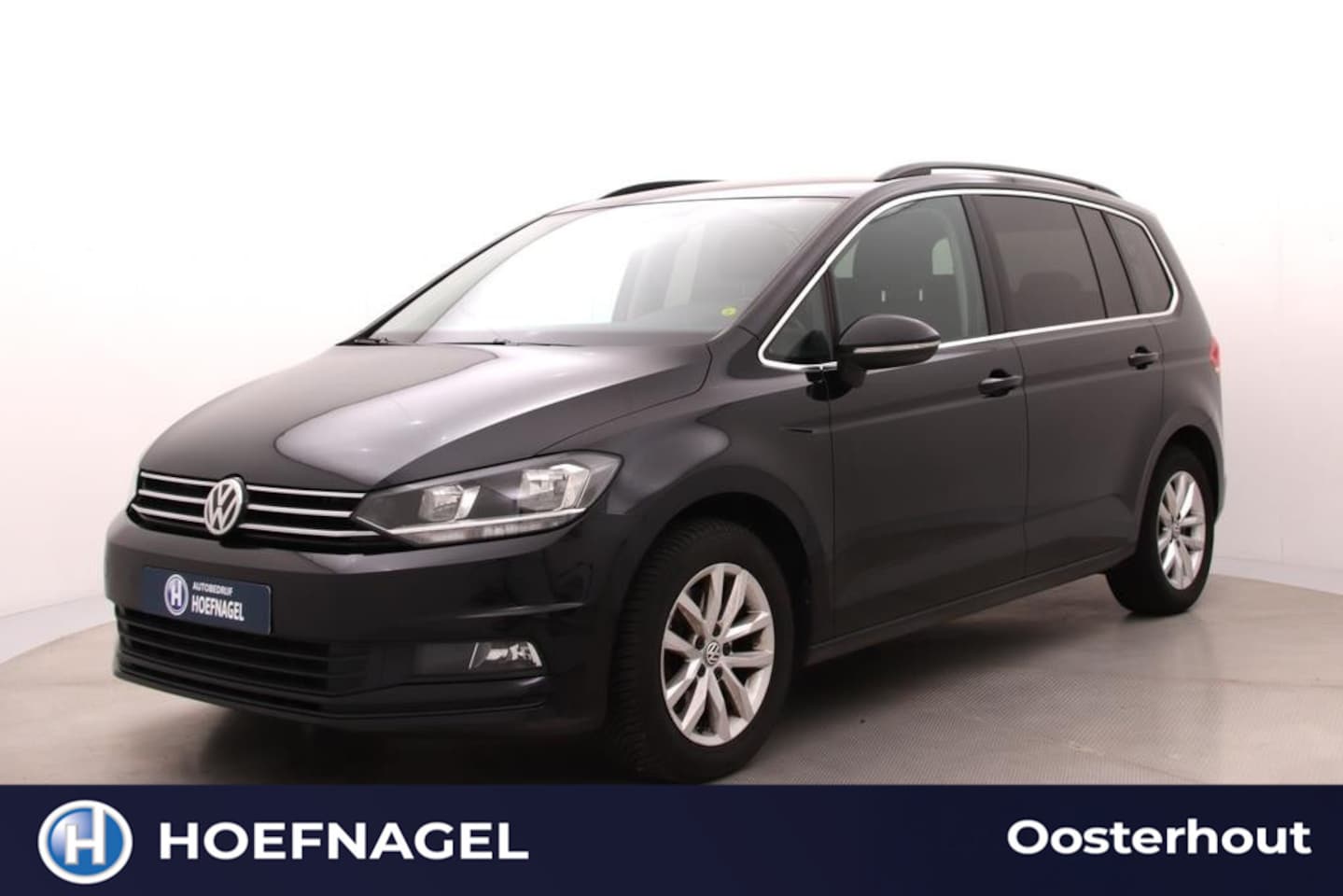 Volkswagen Touran - 1.5 TSI Comfortline Business 7p Automaat | Adaptive Cruise | Stoelverwarming | Parkeersens - AutoWereld.nl