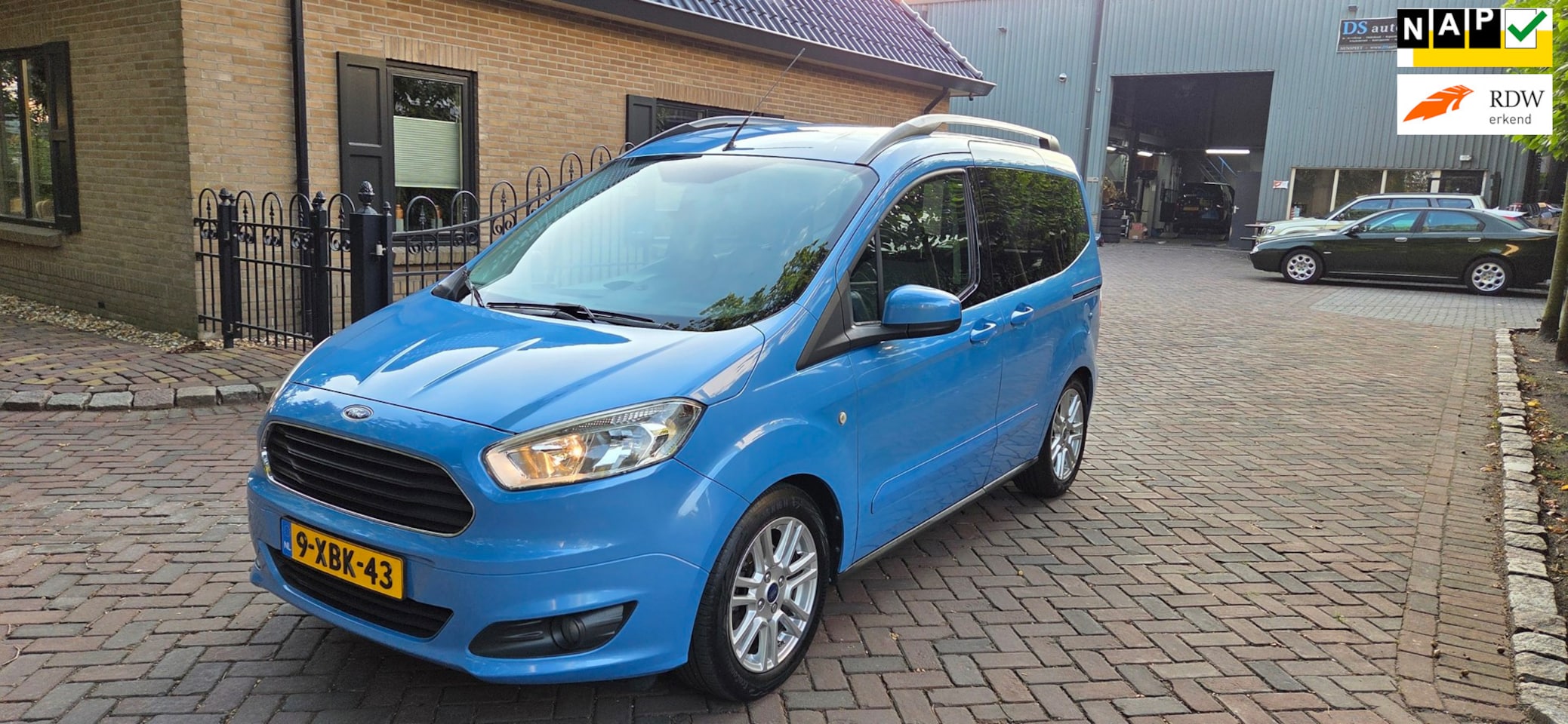 Ford Tourneo Courier - 1.0 Titanium /STOELVW/CRUISE/NAVI/BT/CAMERA/D.RIEM VERVAN - AutoWereld.nl