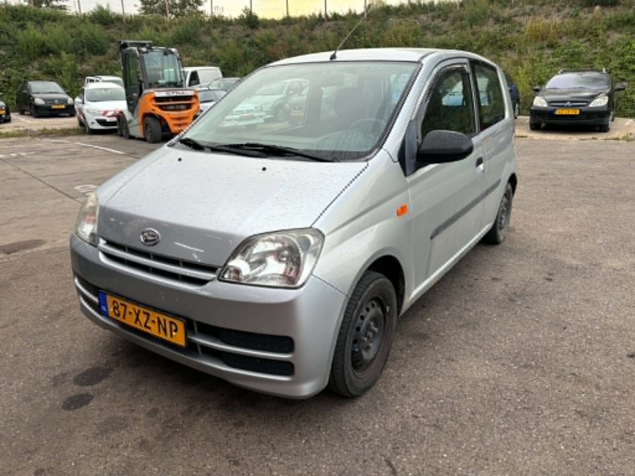 Daihatsu Cuore - 1.0 Summer Edition 1.0 Summer Edition - AutoWereld.nl