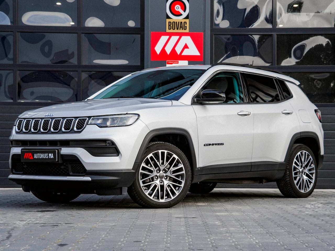 Jeep Compass - 4xe 190 Plug-in Hybrid Electric Limited | PANO | WINTERPAKKET | HALF LEDER | ADAPTIVE - AutoWereld.nl