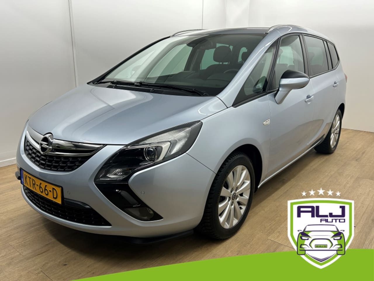 Opel Zafira Tourer - Occasion 1.4 Edition 7p. | Grijs | Tweedehands Opel Zafira | Airco | Cruise | Bluetooth | - AutoWereld.nl