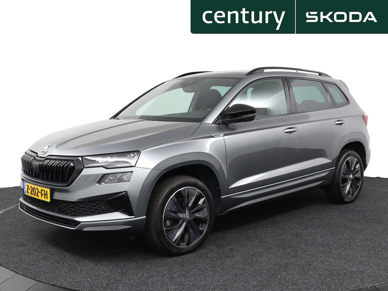 Skoda Karoq - 1.5 TSI 150Pk ACT Sportline Business / Camera / Clima / Pdc / Trekhaak - AutoWereld.nl