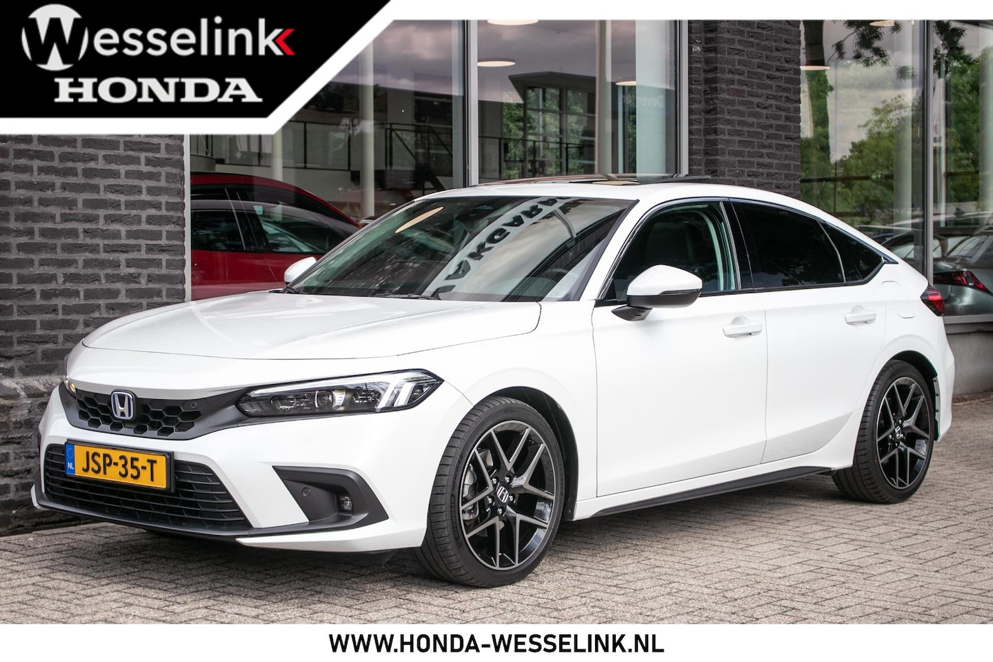 Honda Civic - 2.0 e:HEV Advance | Schuifdak | Navi | Leder - AutoWereld.nl