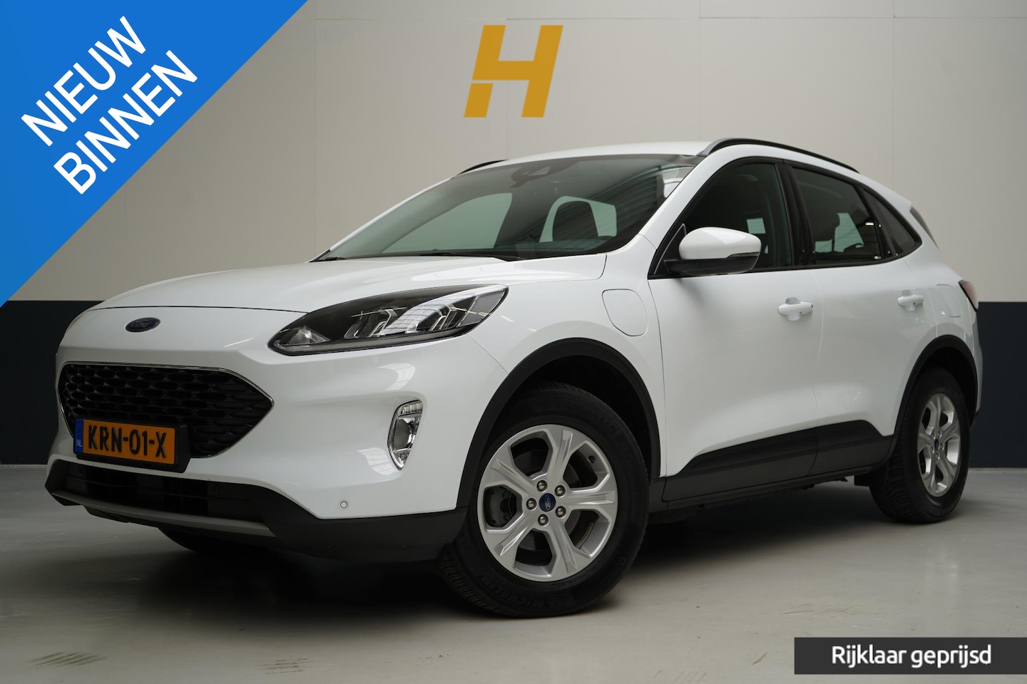Ford Kuga - 2.5 PHEV Cool & Sound | SoH 75% | All-seasonbanden | Trekhaak | stoelverwarming - AutoWereld.nl