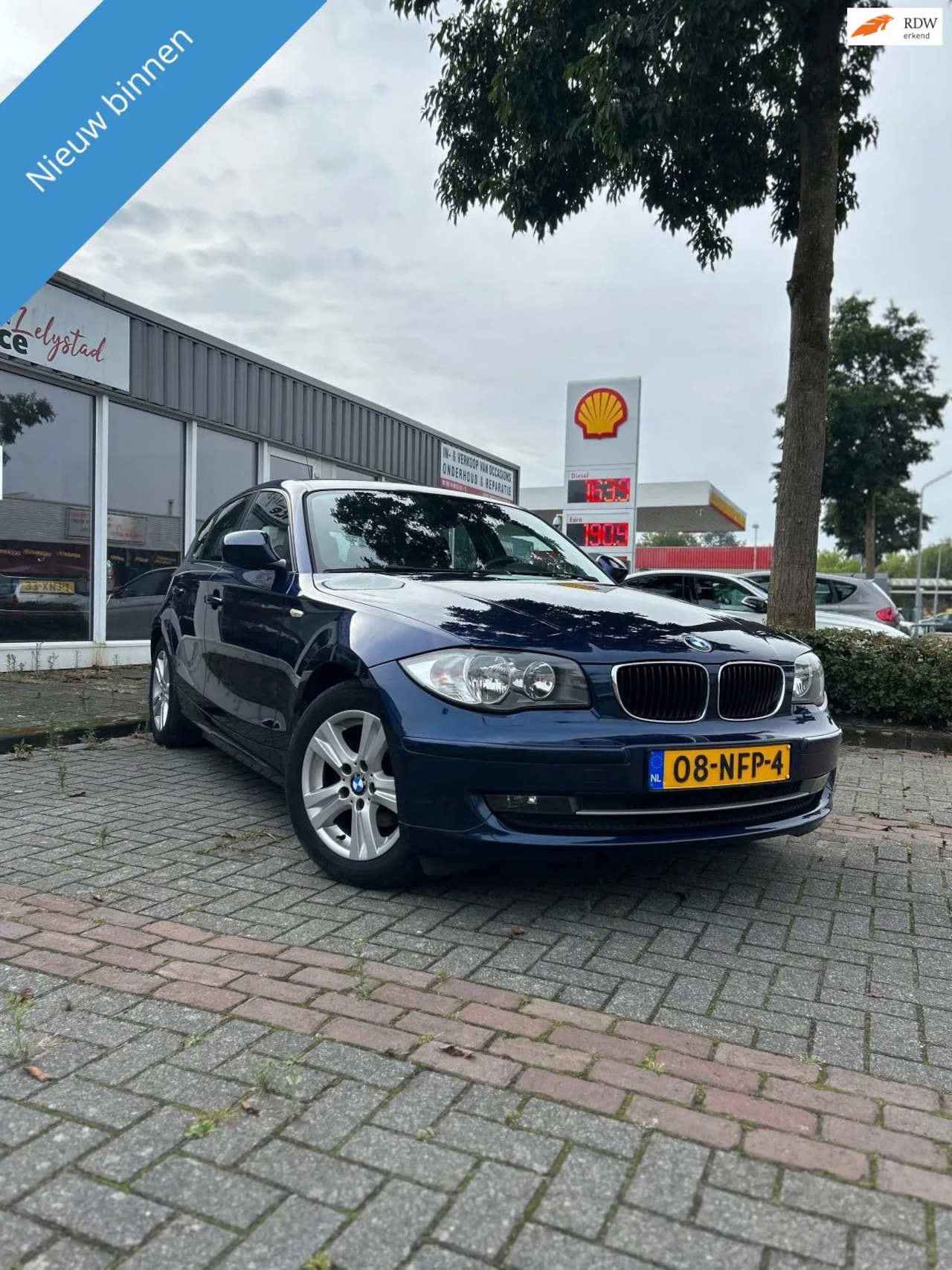 BMW 1-serie - 116i Business Line BMW 116i Business Line gereviseerde motor| LM velgen| Nette auto - AutoWereld.nl