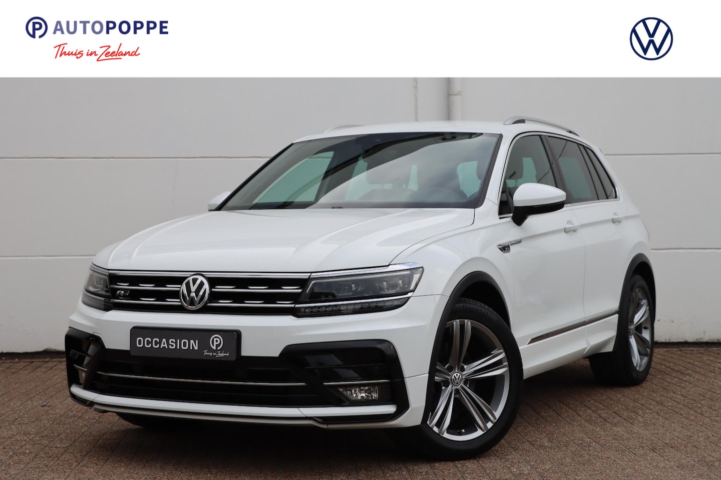 Volkswagen Tiguan - 1.4 TSI Comfortline Business R 1.4 TSI Comfortline Business R 125pk - AutoWereld.nl