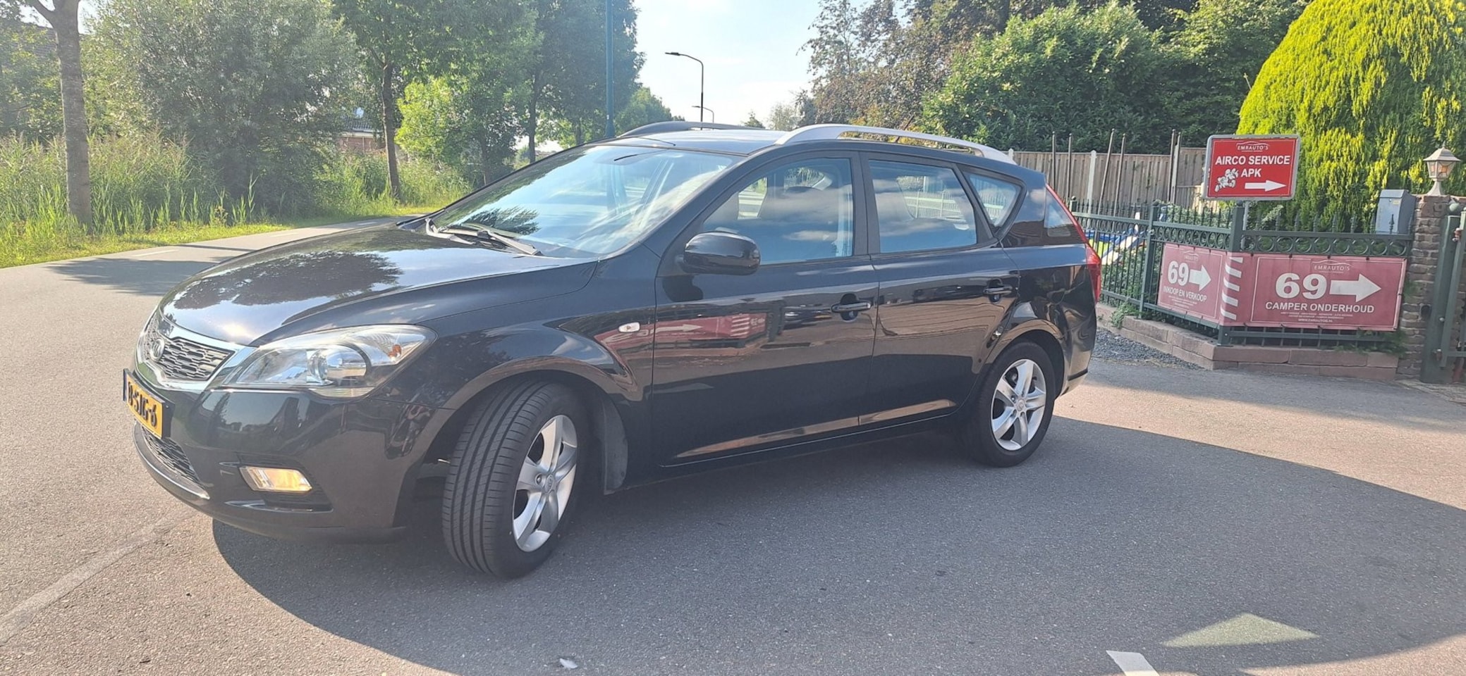 Kia Cee'd Sporty Wagon - 1.4 CVVT X-ecutive 1.4 CVVT X-ecutive - AutoWereld.nl