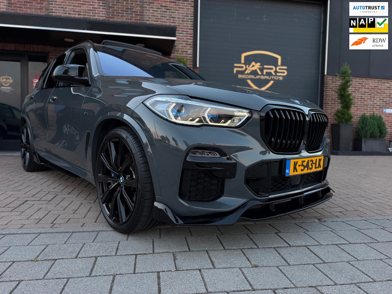 BMW X5 - XDrive45e High Executive + M Performance Dravitgrau Laserlight Sky Lounge Panoramadak Body - AutoWereld.nl