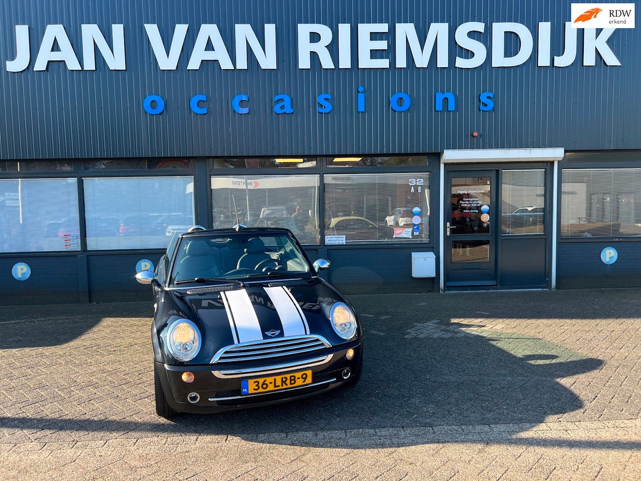 MINI Cabrio - 1.6 Cooperbj2006 cabriolet sportvelgen - AutoWereld.nl