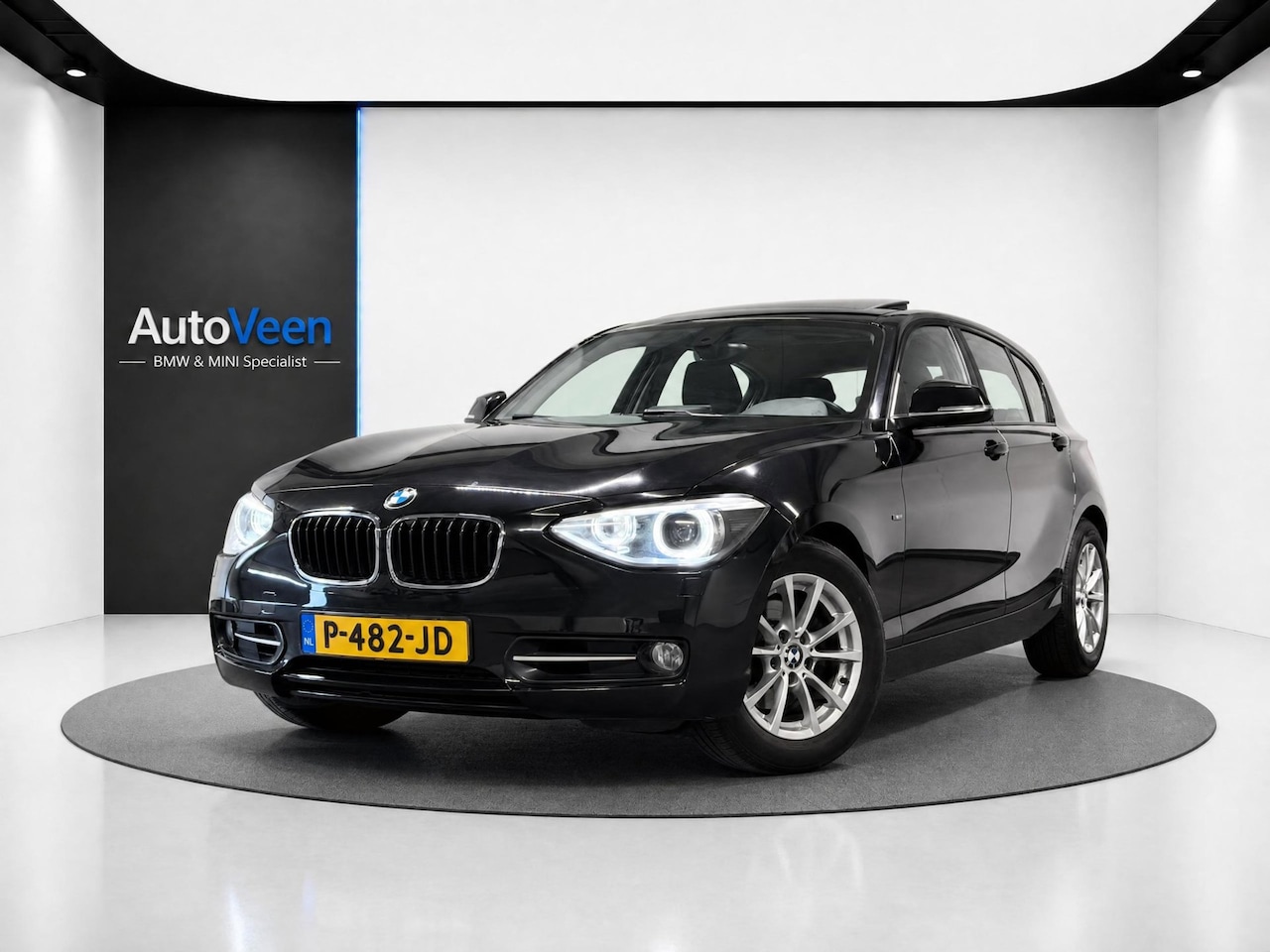 BMW 1-serie - 118i High Executive Upgrade (PANO, LED, NAVI, STOELVERWARMING, CRUISE) - AutoWereld.nl