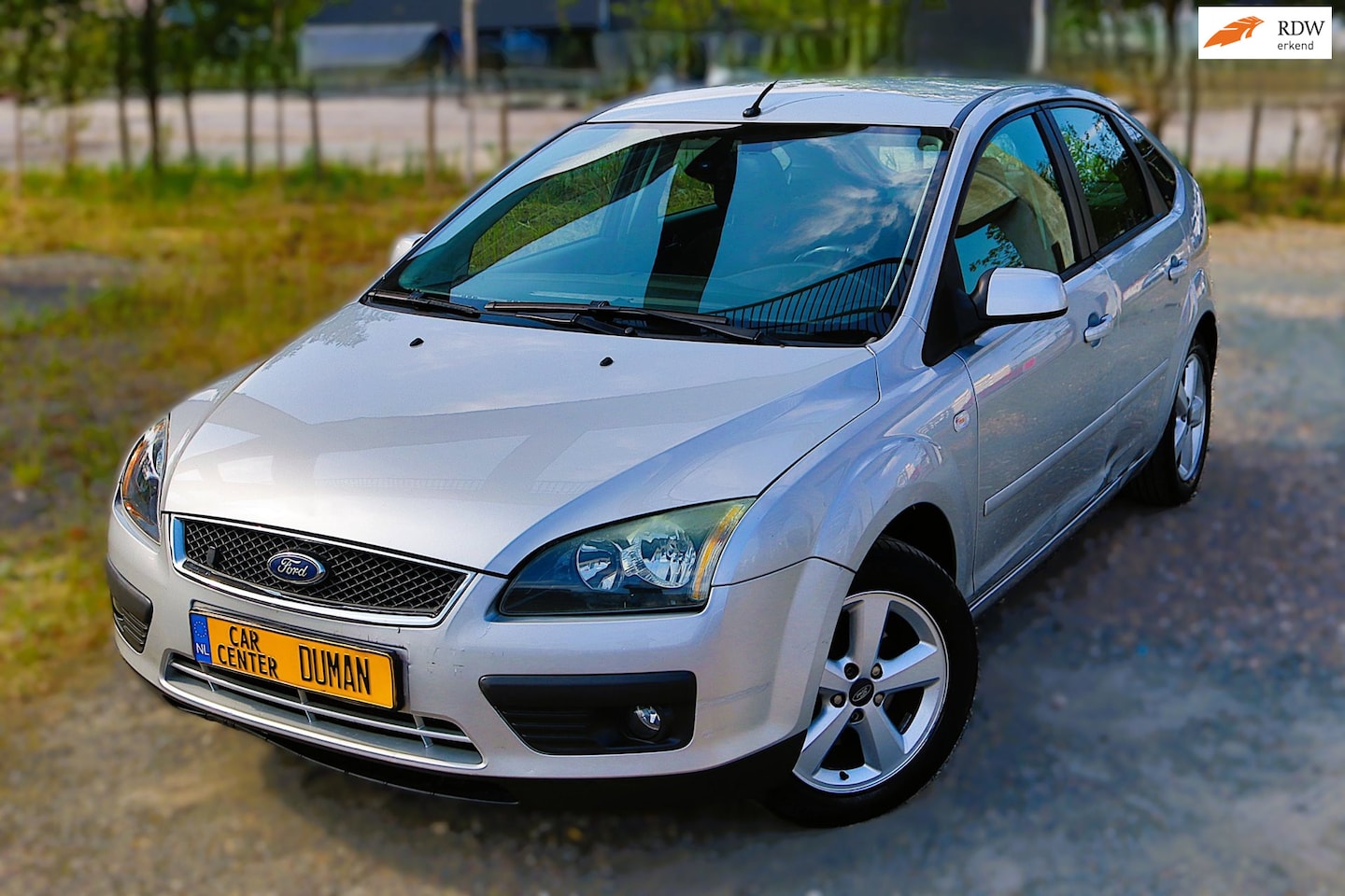 Ford Focus - 1.8-16V Ambiente Flexifuel Navi PDC Trekhaak Cruise Stoelverw - AutoWereld.nl